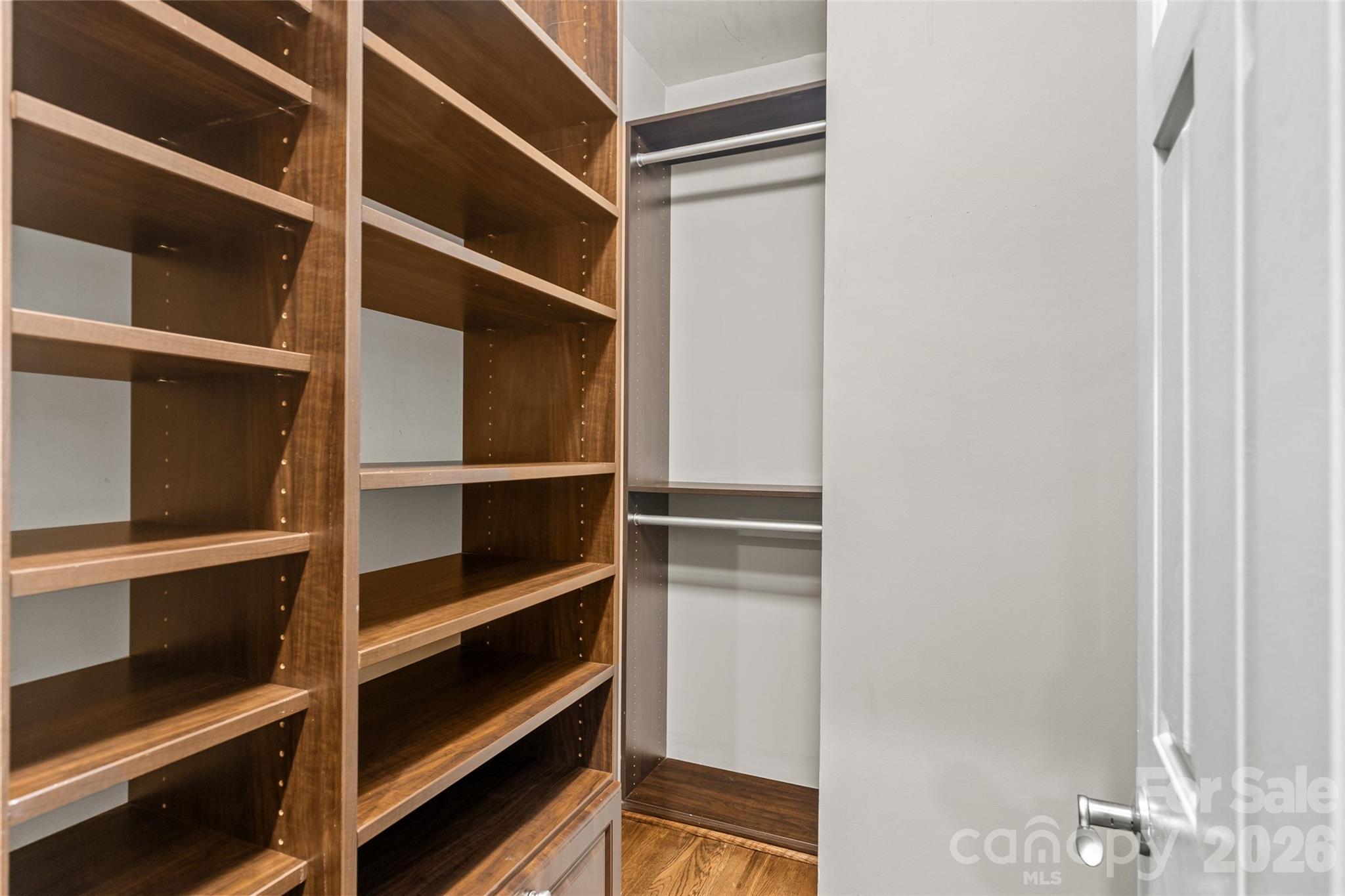 127 North Tryon Street, Unit 410 Charlotte, NC 28246 - Photo 12 of 37 a view of walk in closet with empty racks