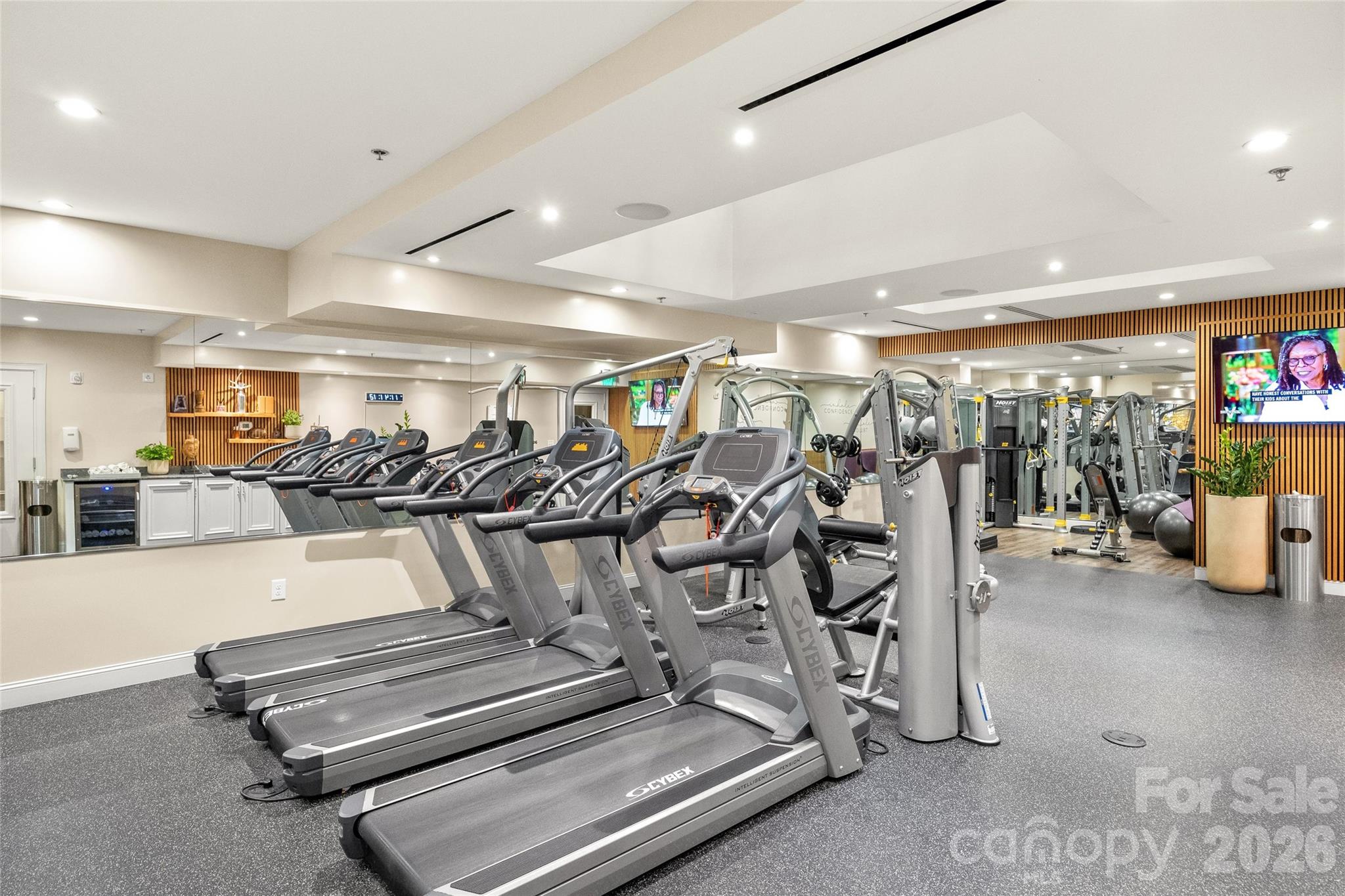 127 North Tryon Street, Unit 410 Charlotte, NC 28246 - Photo 27 of 37 a view of a room with gym equipment
