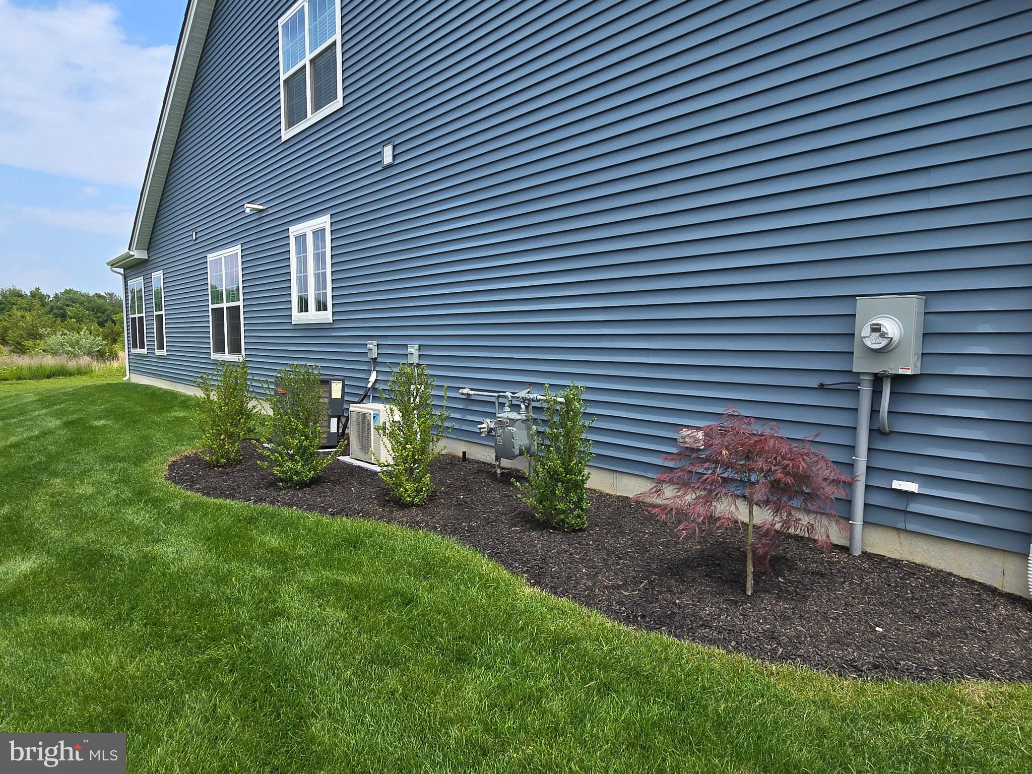 35 Queensferry Drive Williamstown, NJ 08094 - Photo 3 of 63 a view of a chair and table in backyard of the house
