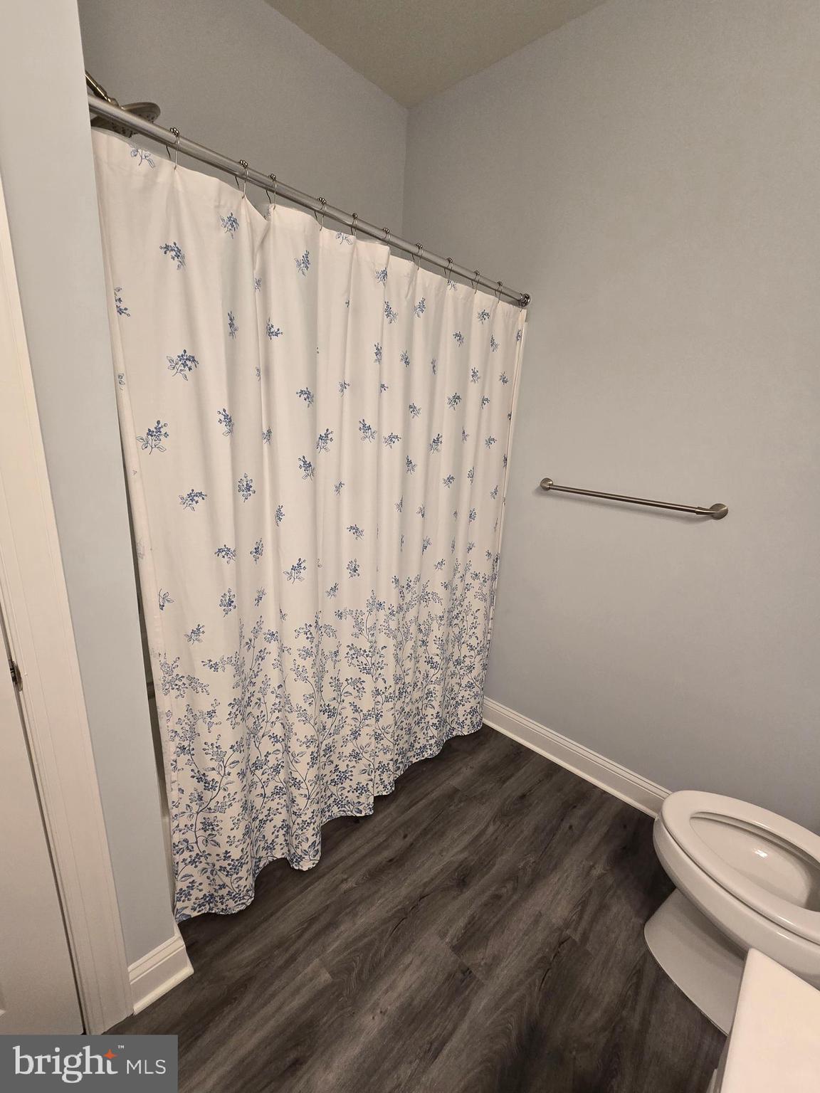 35 Queensferry Drive Williamstown, NJ 08094 - Photo 32 of 63 a bathroom with a toilet and shower curtain