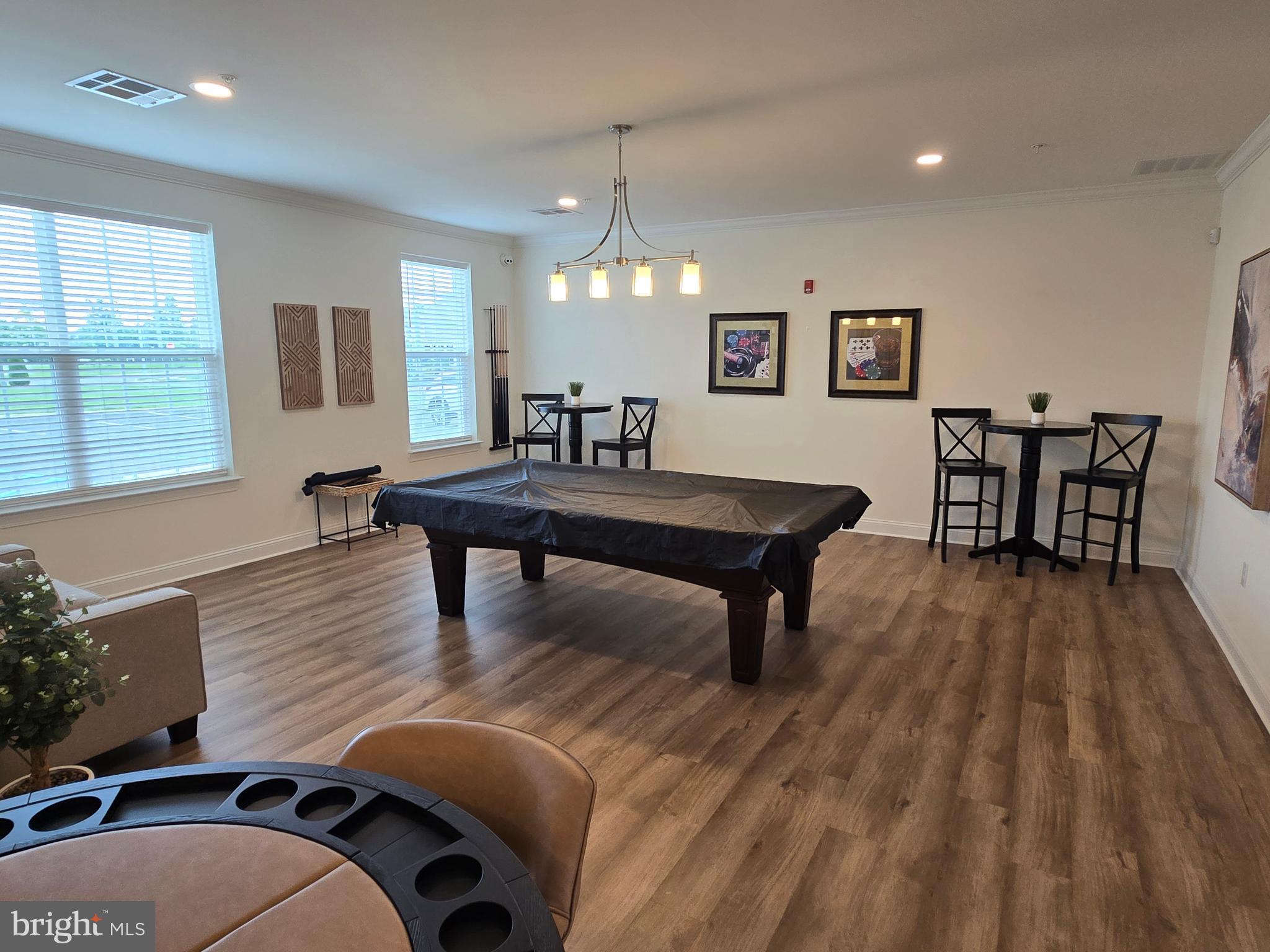 35 Queensferry Drive Williamstown, NJ 08094 - Photo 60 of 63 a dining room with wooden floor a chandelier a wooden table and chairs