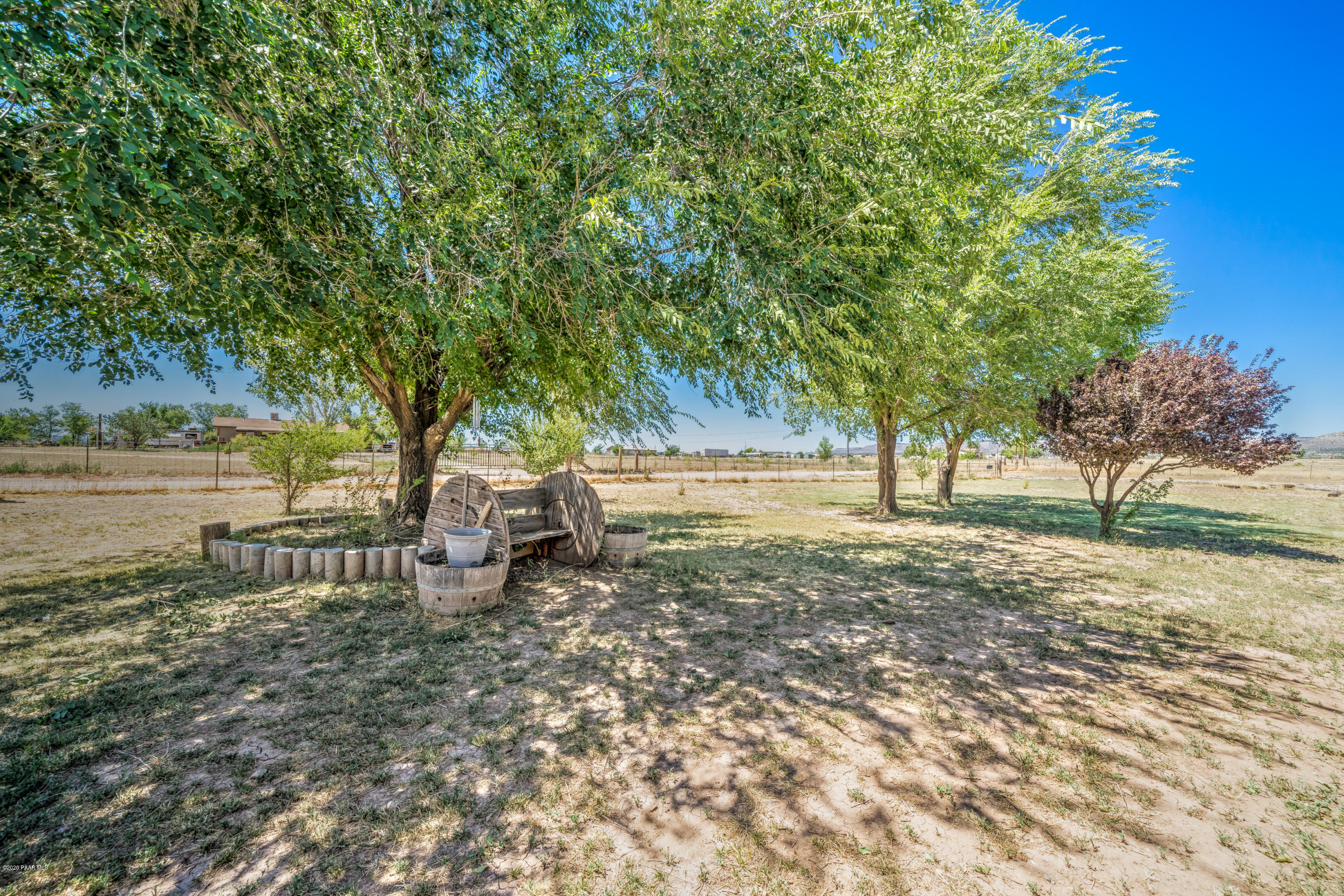 25125 North Mitchell Road Paulden, AZ 86334 - Photo 2 of 18 a view of a park with bench and trees