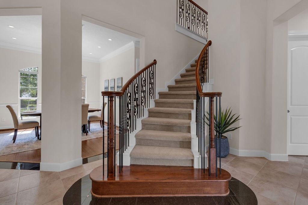 7306 Starflower Katy, TX 77494 - Photo 9 of 50 a view of entryway and hall with wooden floor