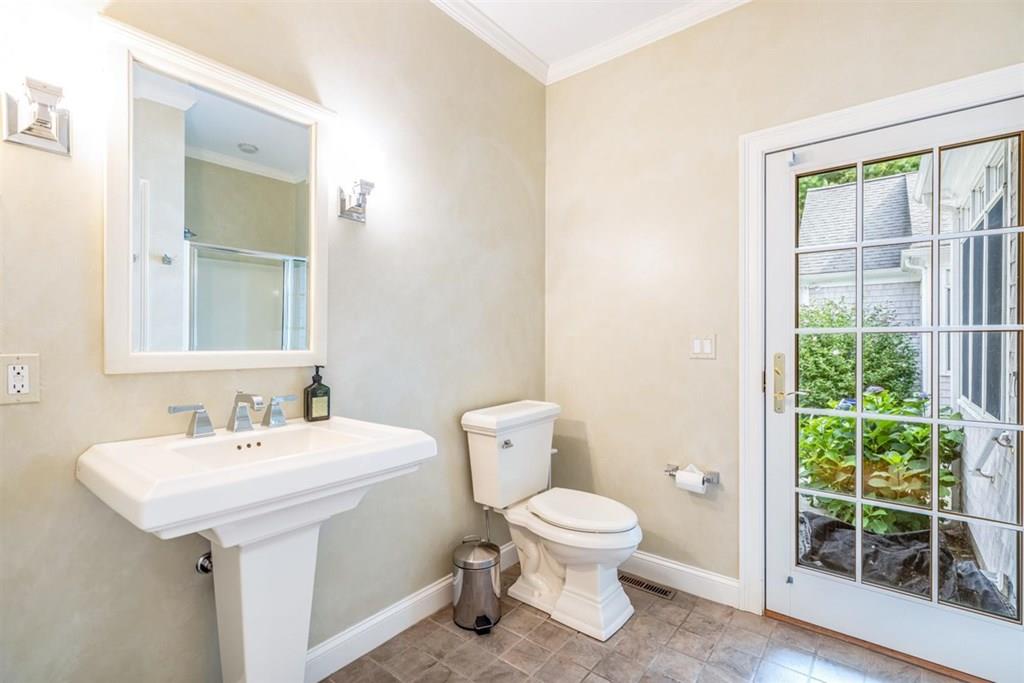21 Hayden Ridge Plymouth, MA 02360 - Photo 11 of 34 a bathroom with a toilet sink and a mirror