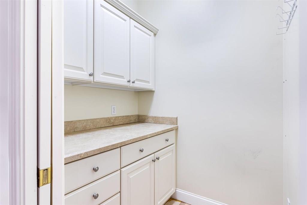 21 Hayden Ridge Plymouth, MA 02360 - Photo 13 of 34 a view of cabinets and wooden floor