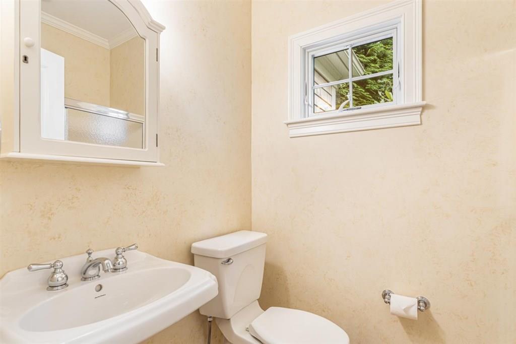 21 Hayden Ridge Plymouth, MA 02360 - Photo 17 of 34 a bathroom with a sink and mirror with toilet