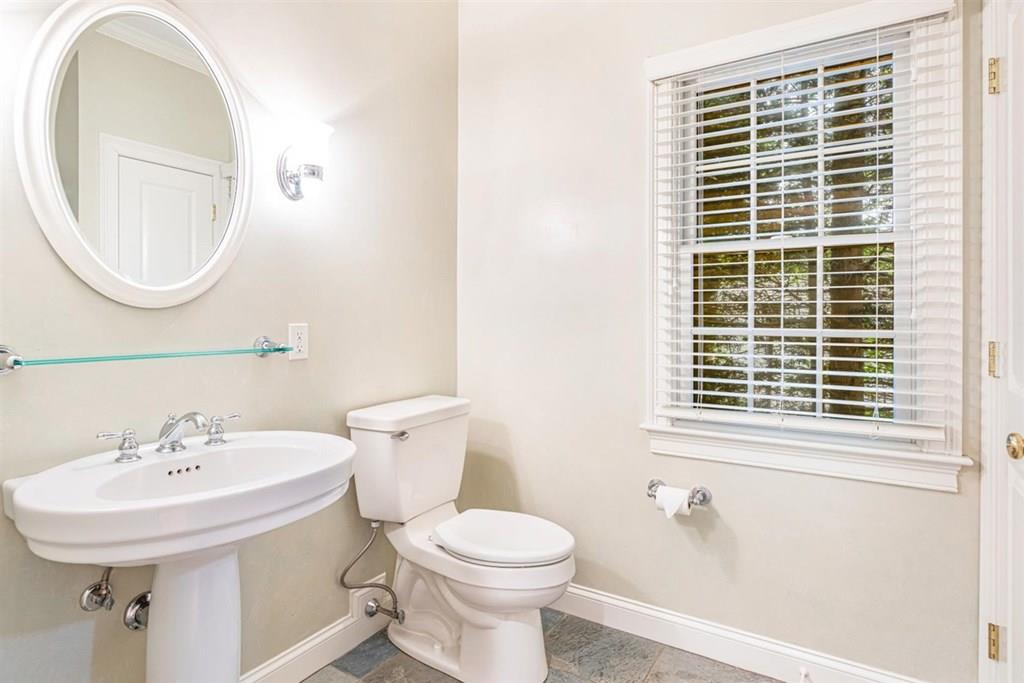 21 Hayden Ridge Plymouth, MA 02360 - Photo 21 of 34 a bathroom with a sink a mirror and a toilet