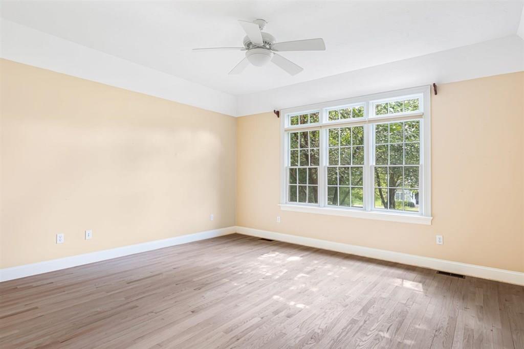 21 Hayden Ridge Plymouth, MA 02360 - Photo 24 of 34 an empty room with wooden floor and windows