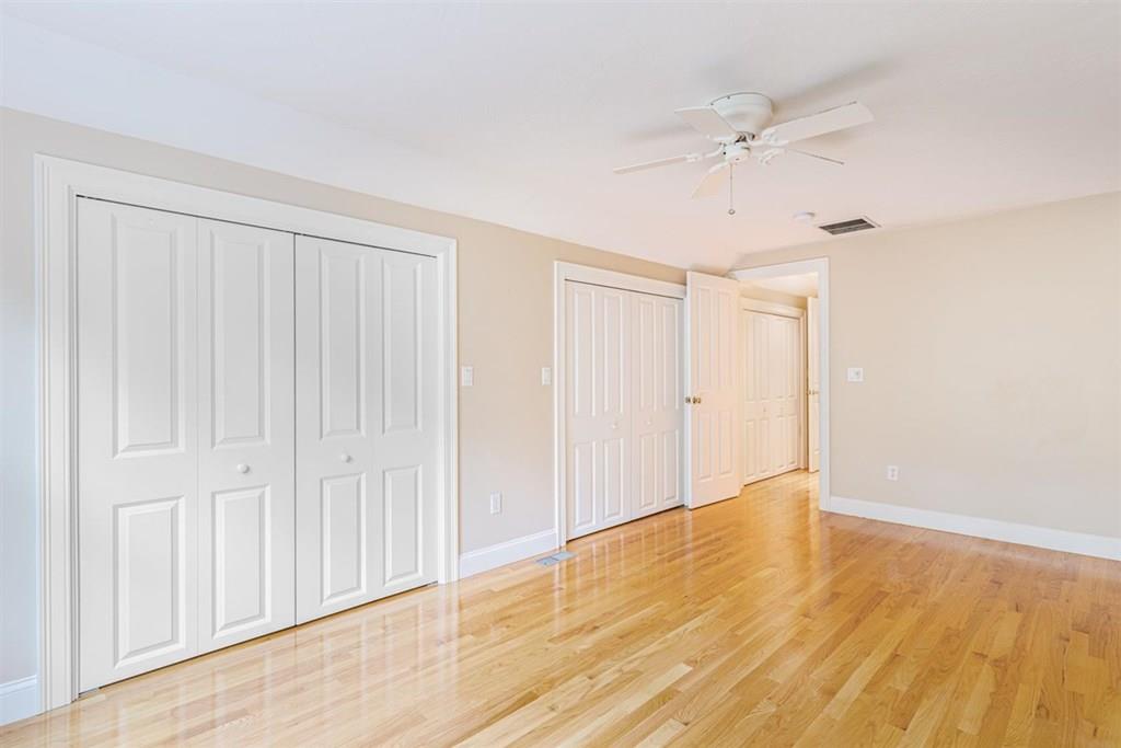 21 Hayden Ridge Plymouth, MA 02360 - Photo 25 of 34 a view of an empty room with wooden floor