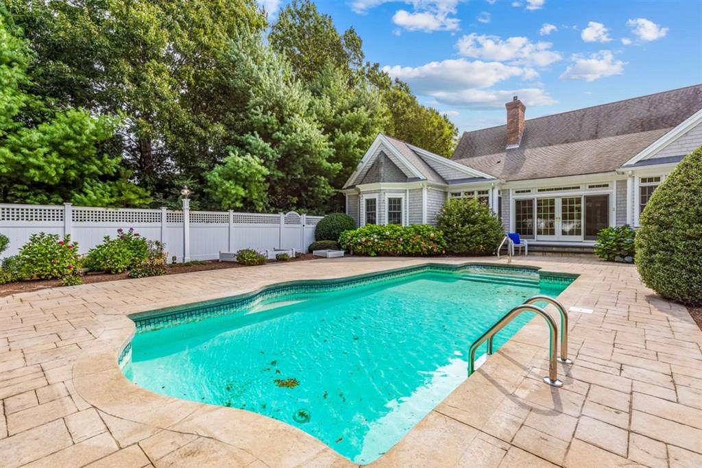21 Hayden Ridge Plymouth, MA 02360 - Photo 31 of 34 a view of a house with a backyard and a patio