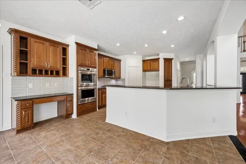 $765,000 | 5915 Saratoga Springs Lane, Houston, TX 77041