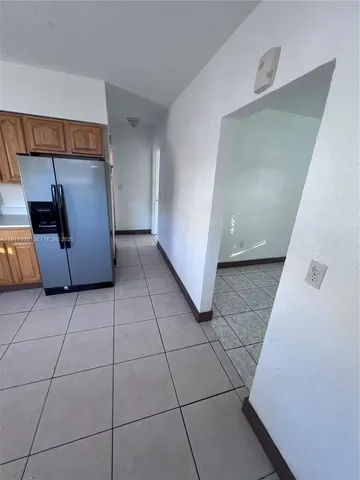 a view of a kitchen with a sink