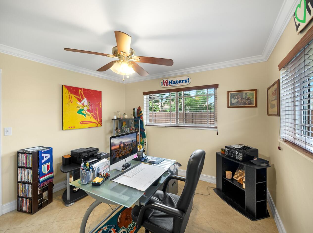 355 Northeast 24th Street Boca Raton, FL 33431 - Photo 11 of 15 a workspace with furniture and window