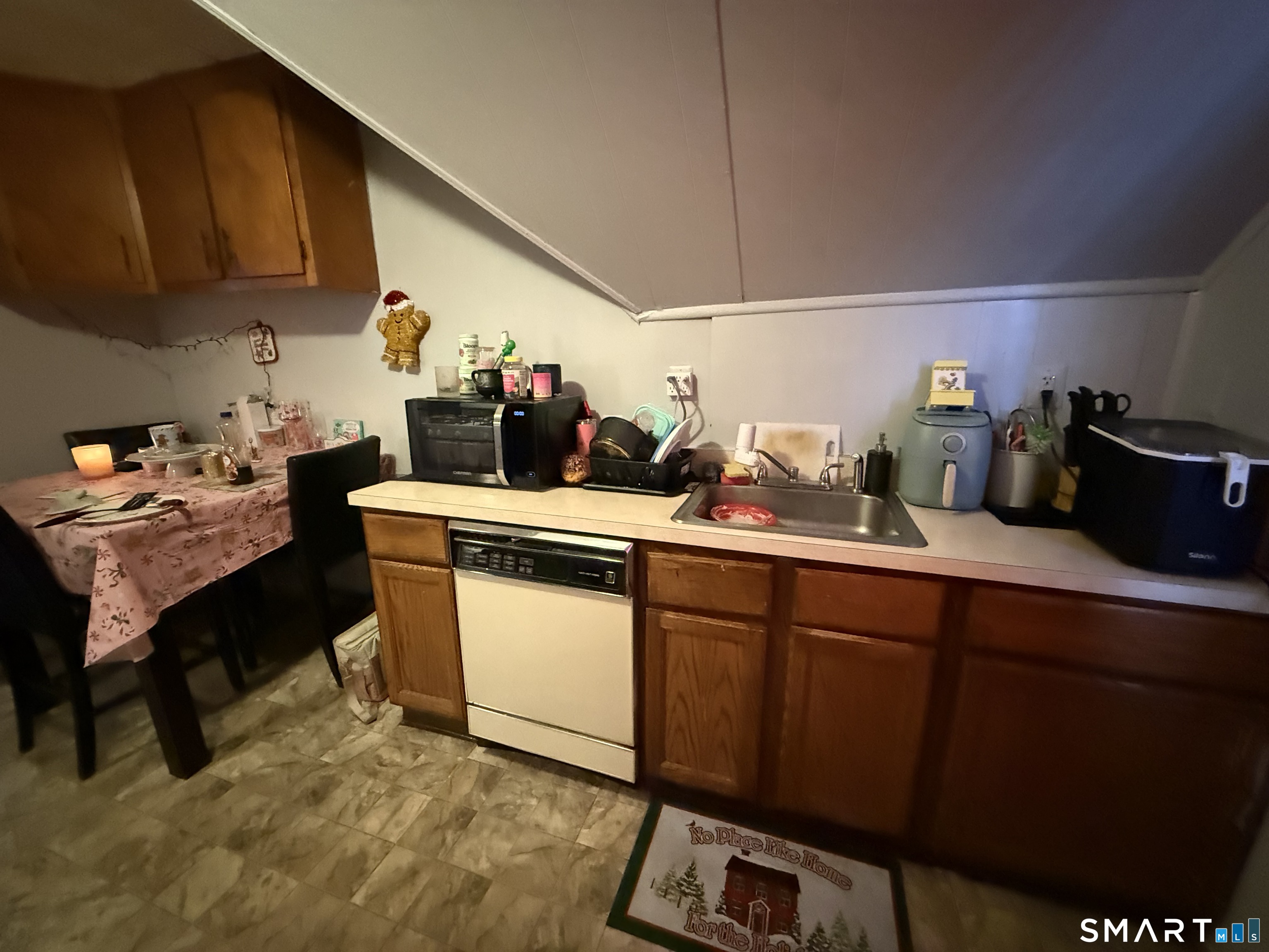 74 George Street Bristol, CT 06010 - Photo 4 of 12 a kitchen with sink cabinets and appliances