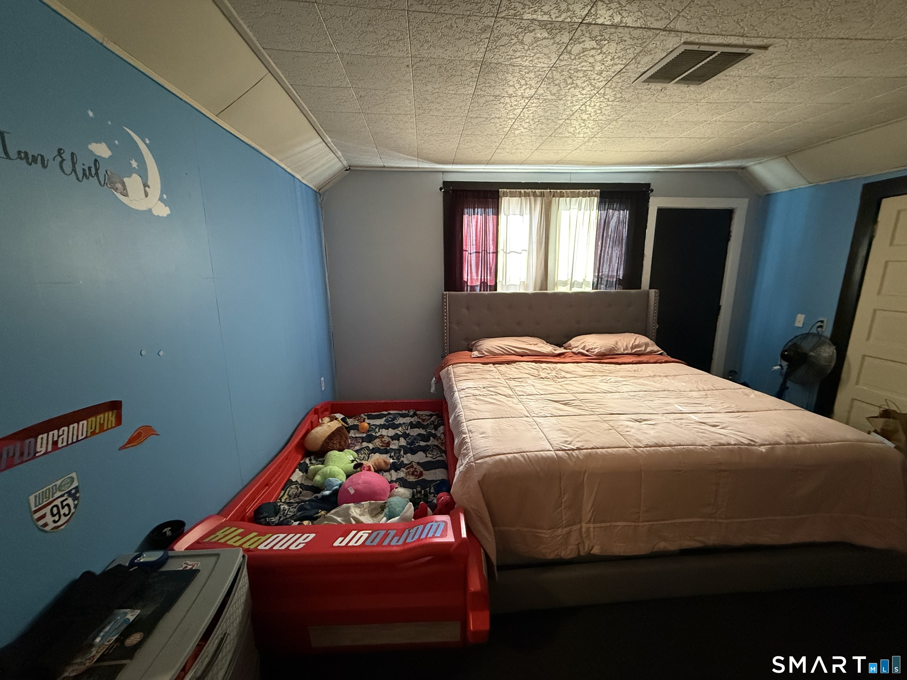 74 George Street Bristol, CT 06010 - Photo 6 of 12 a bedroom with a bed and a window