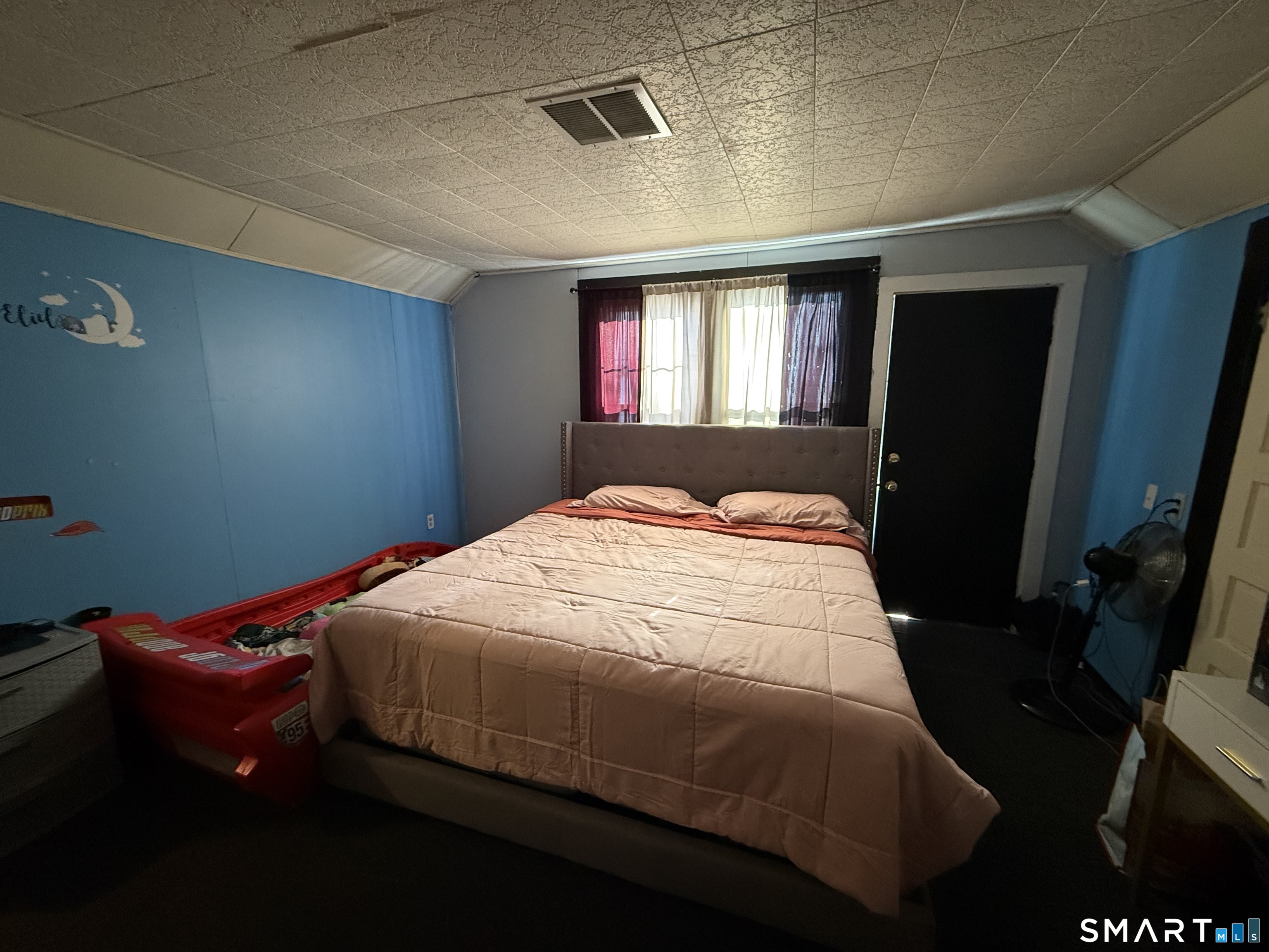 74 George Street Bristol, CT 06010 - Photo 7 of 12 a bedroom with a bed and a window