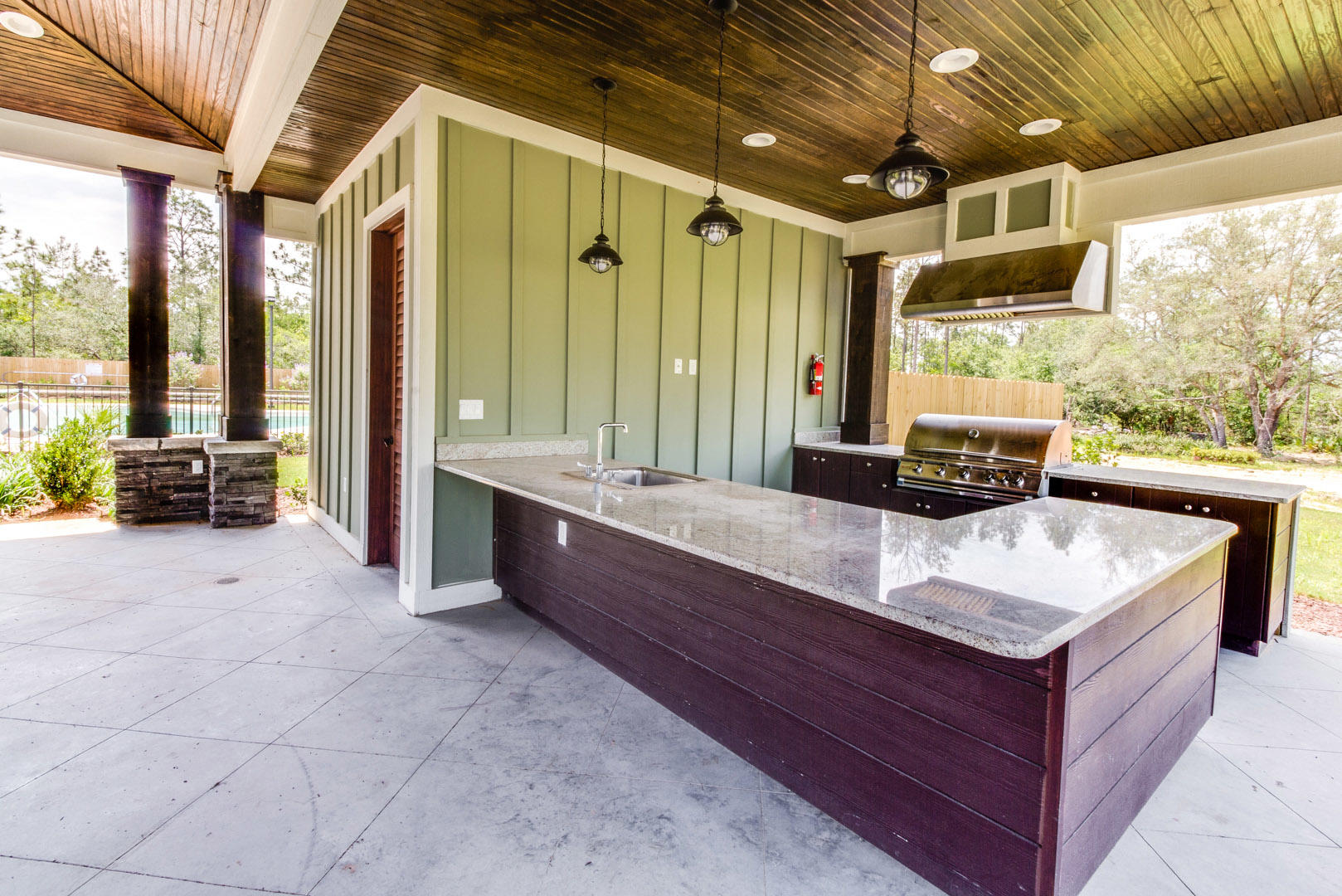 311 Merlin Court Crestview, FL 32539 - Photo 16 of 17 Redstone pool house kitchen