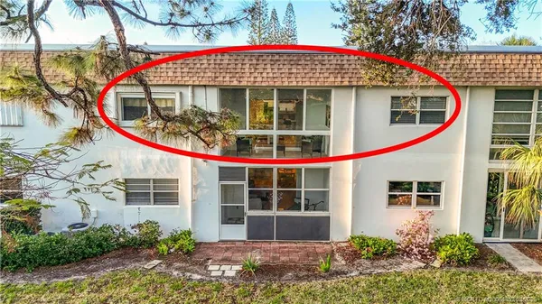 a front view of a house with entertaining space