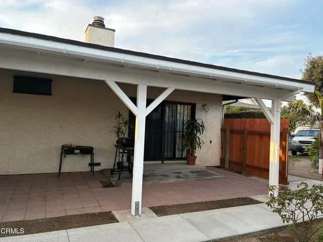 a view of a house with a porch
