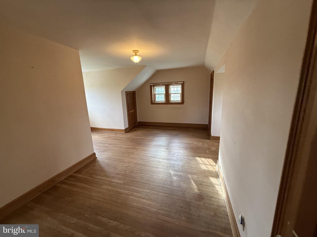6245 Middleburg Road Keymar, MD 21757 - Photo 57 of 77 a view of a hallway with wooden floor and a window