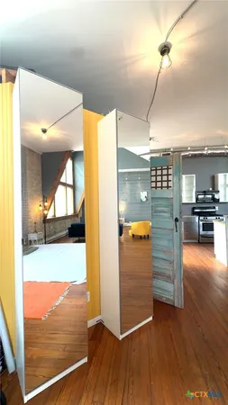 a view of a living room and bathroom