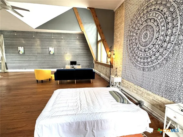 a view of swimming pool with seating area