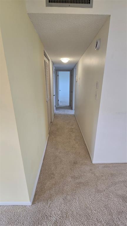 88 Boundary Boulevard, Unit 149 Rotonda West, FL 33947 - Photo 15 of 40 a view of hallway