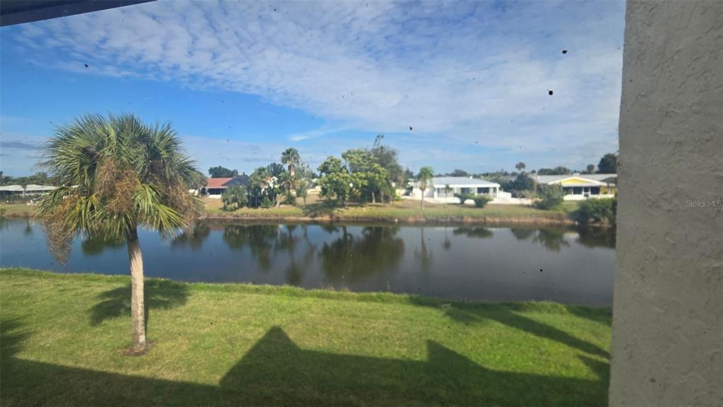 88 Boundary Boulevard, Unit 149 Rotonda West, FL 33947 - Photo 19 of 40 a view of a lake
