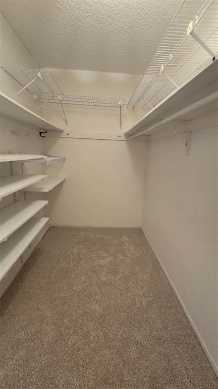 88 Boundary Boulevard, Unit 149 Rotonda West, FL 33947 - Photo 28 of 40 a view of a room with racks on the wall