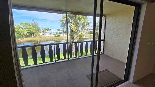 a view of a balcony with ocean view