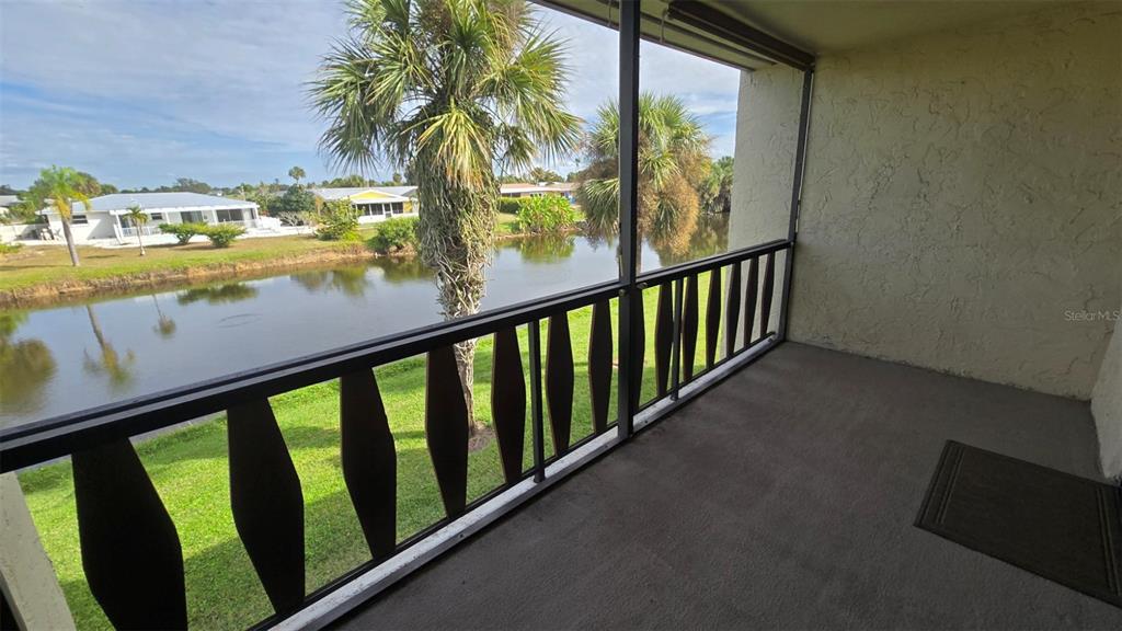 88 Boundary Boulevard, Unit 149 Rotonda West, FL 33947 - Photo 8 of 40 a view of a balcony with ocean view