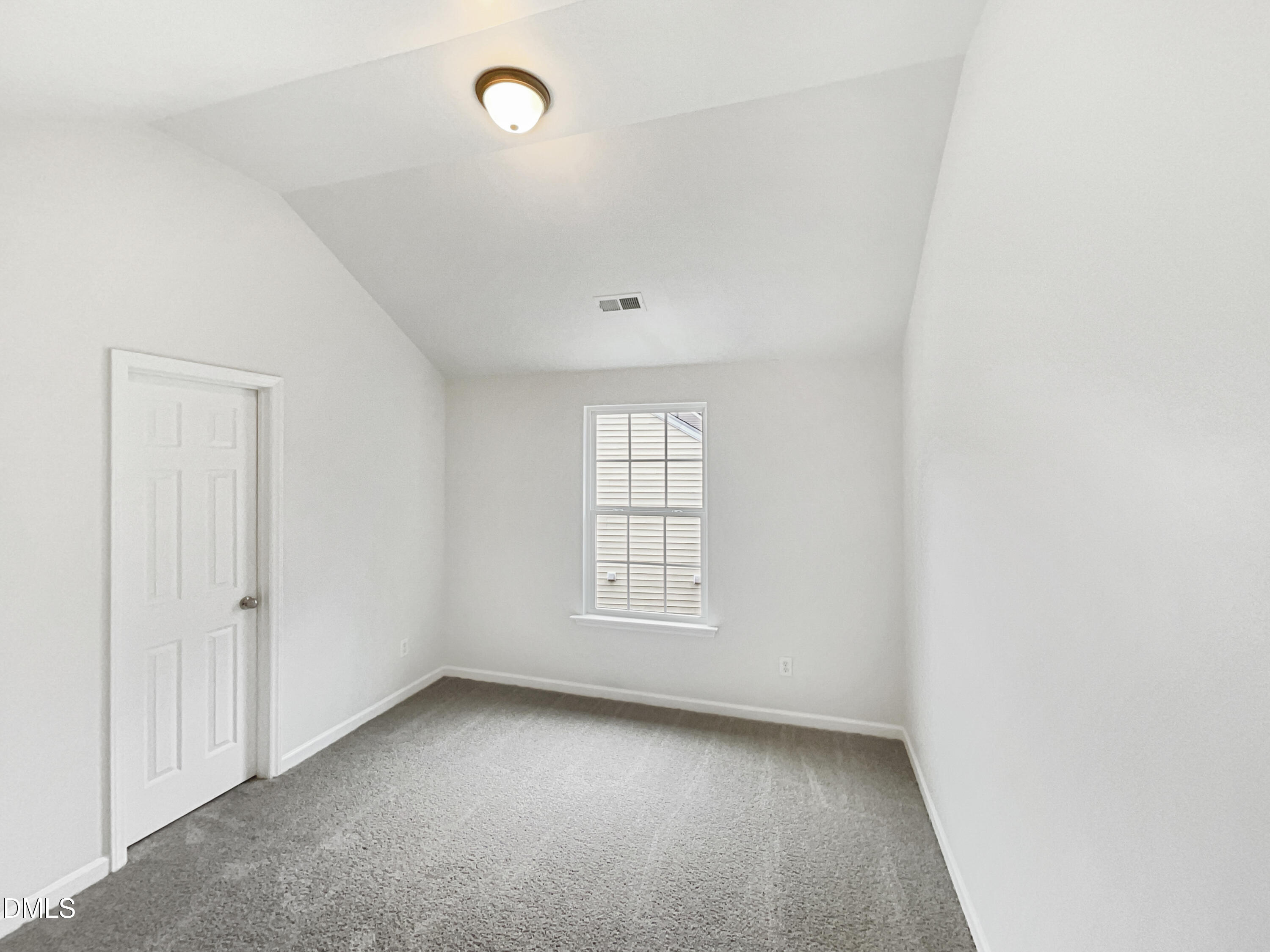 5512 Quitman Trail Raleigh, NC 27610 - Photo 17 of 18 an empty room with window