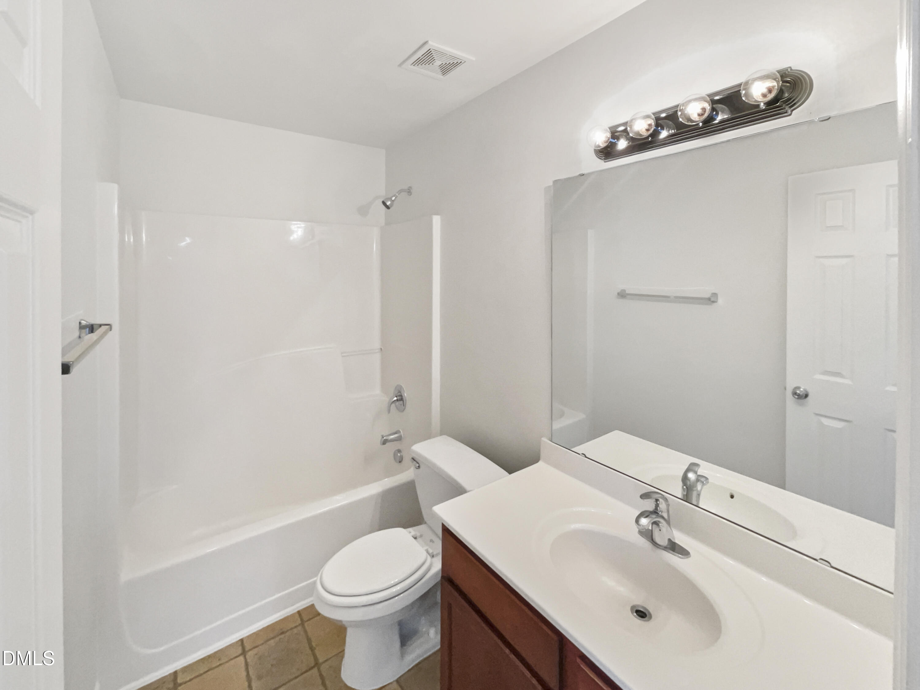 5512 Quitman Trail Raleigh, NC 27610 - Photo 18 of 18 a bathroom with a sink a toilet and shower