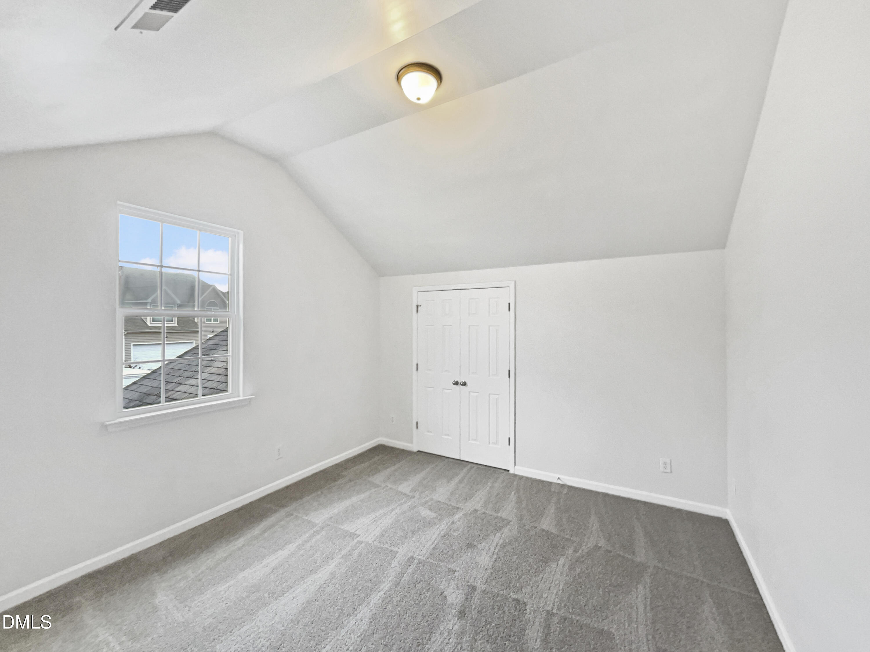 5512 Quitman Trail Raleigh, NC 27610 - Photo 5 of 18 a view of an empty room with a window