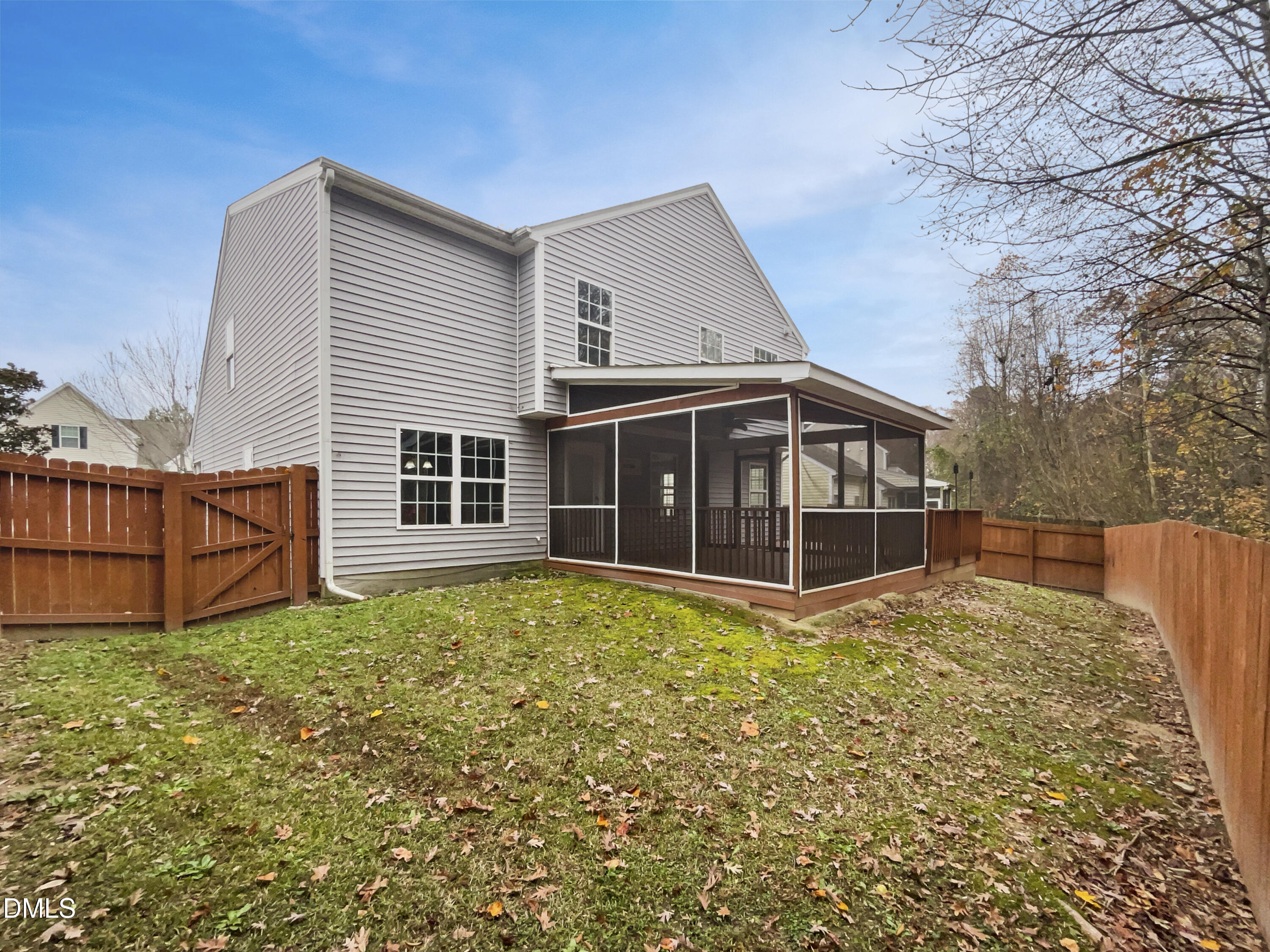 5512 Quitman Trail Raleigh, NC 27610 - Photo 6 of 18 a view of a house with wooden fence