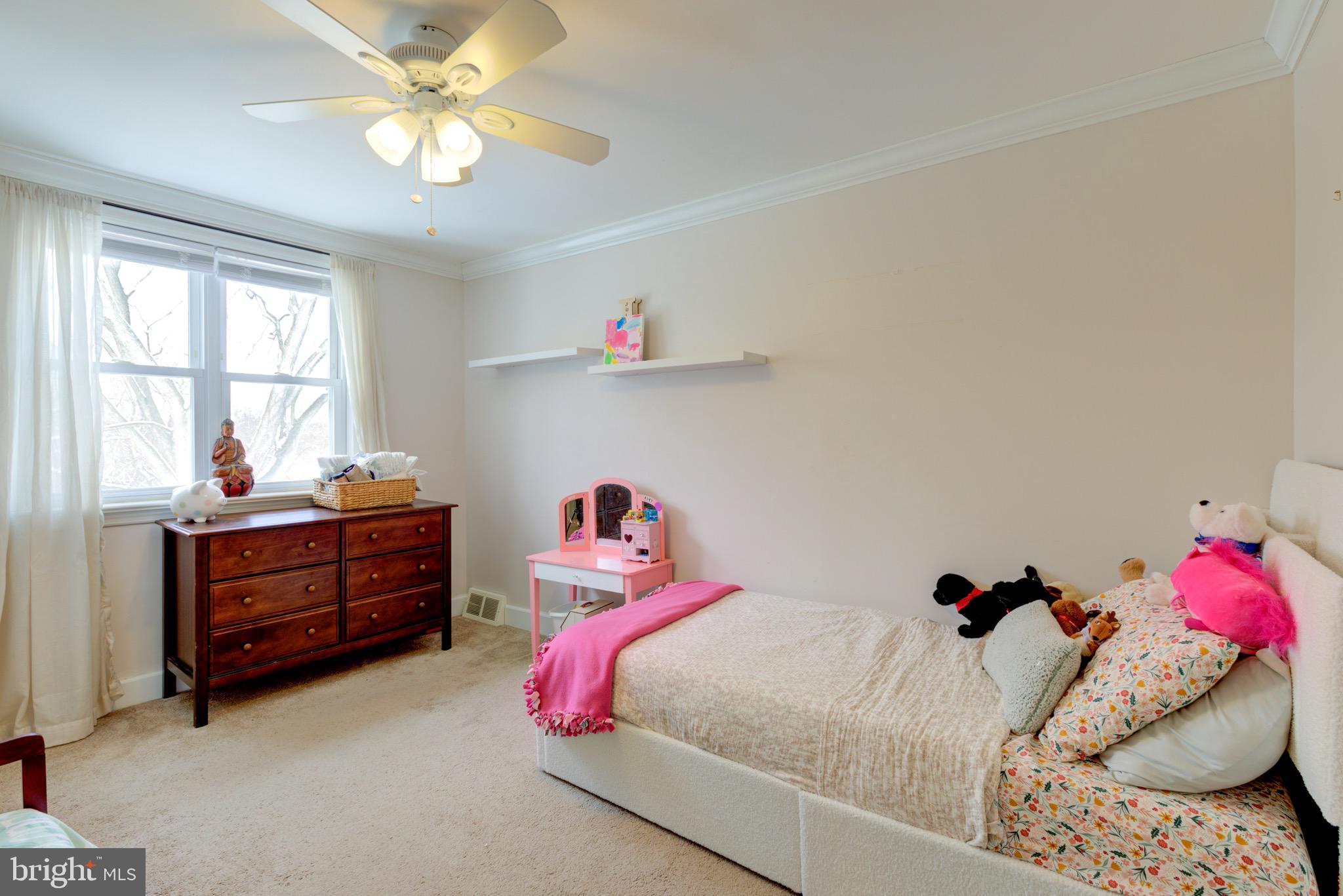 203 Overlook Road Philadelphia, PA 19128 - Photo 20 of 32 a bedroom with a bed and a window