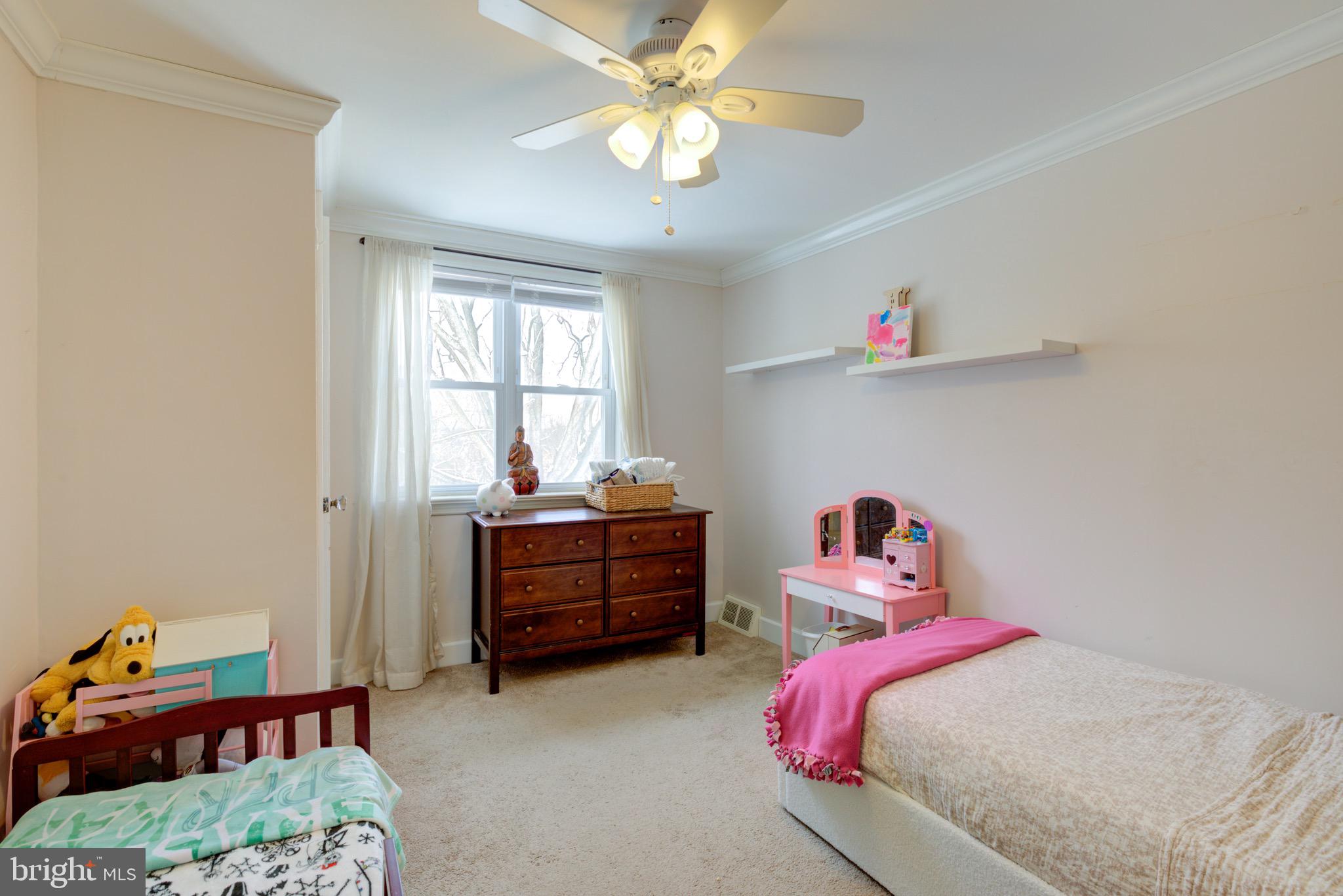 203 Overlook Road Philadelphia, PA 19128 - Photo 21 of 32 a bedroom with furniture and a chandelier fan