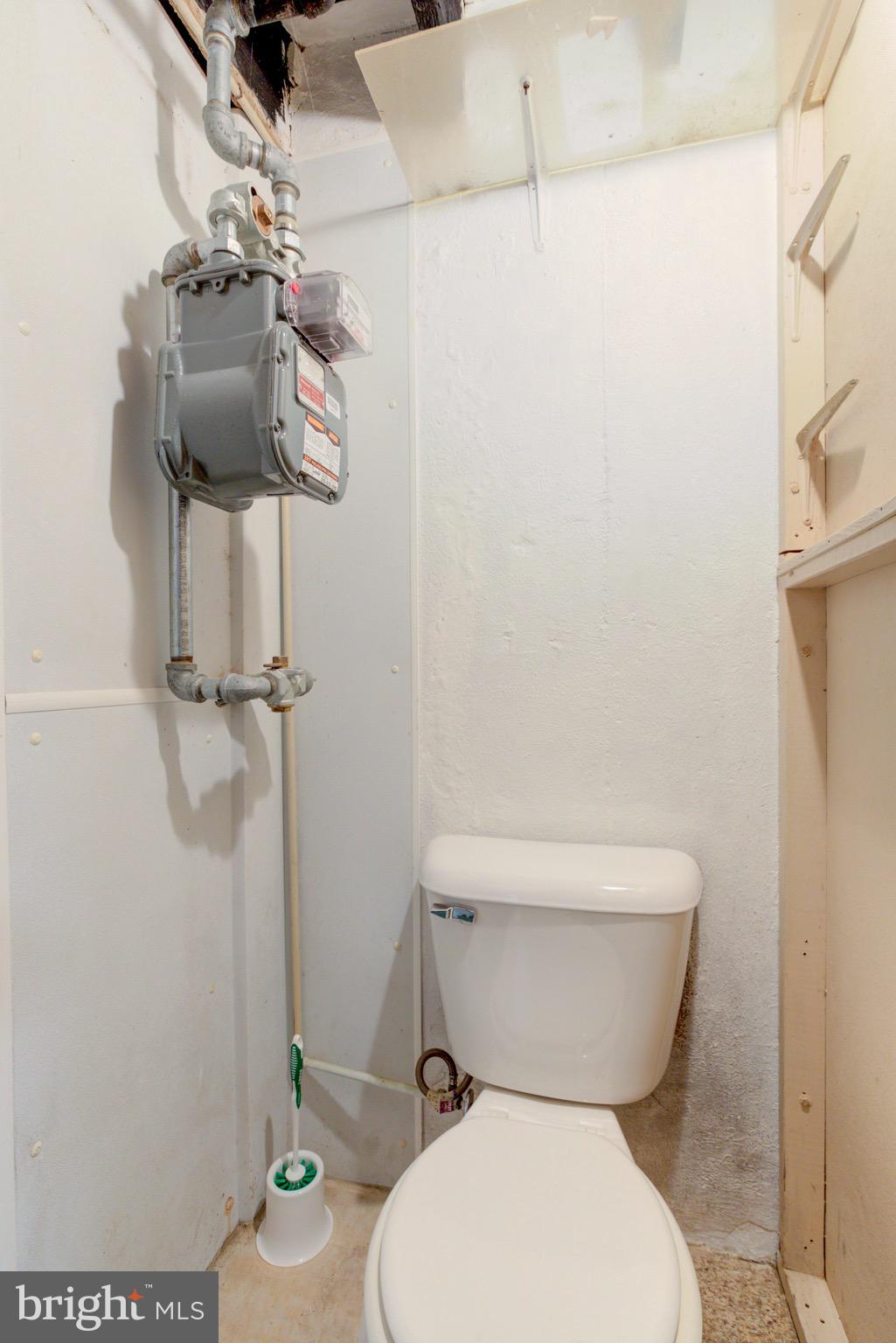 203 Overlook Road Philadelphia, PA 19128 - Photo 26 of 32 a white toilet sitting next to a bathroom sink