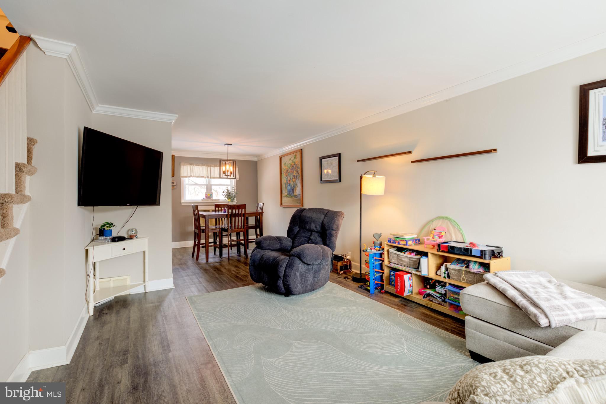 203 Overlook Road Philadelphia, PA 19128 - Photo 4 of 32 a room with furniture and a flat screen tv