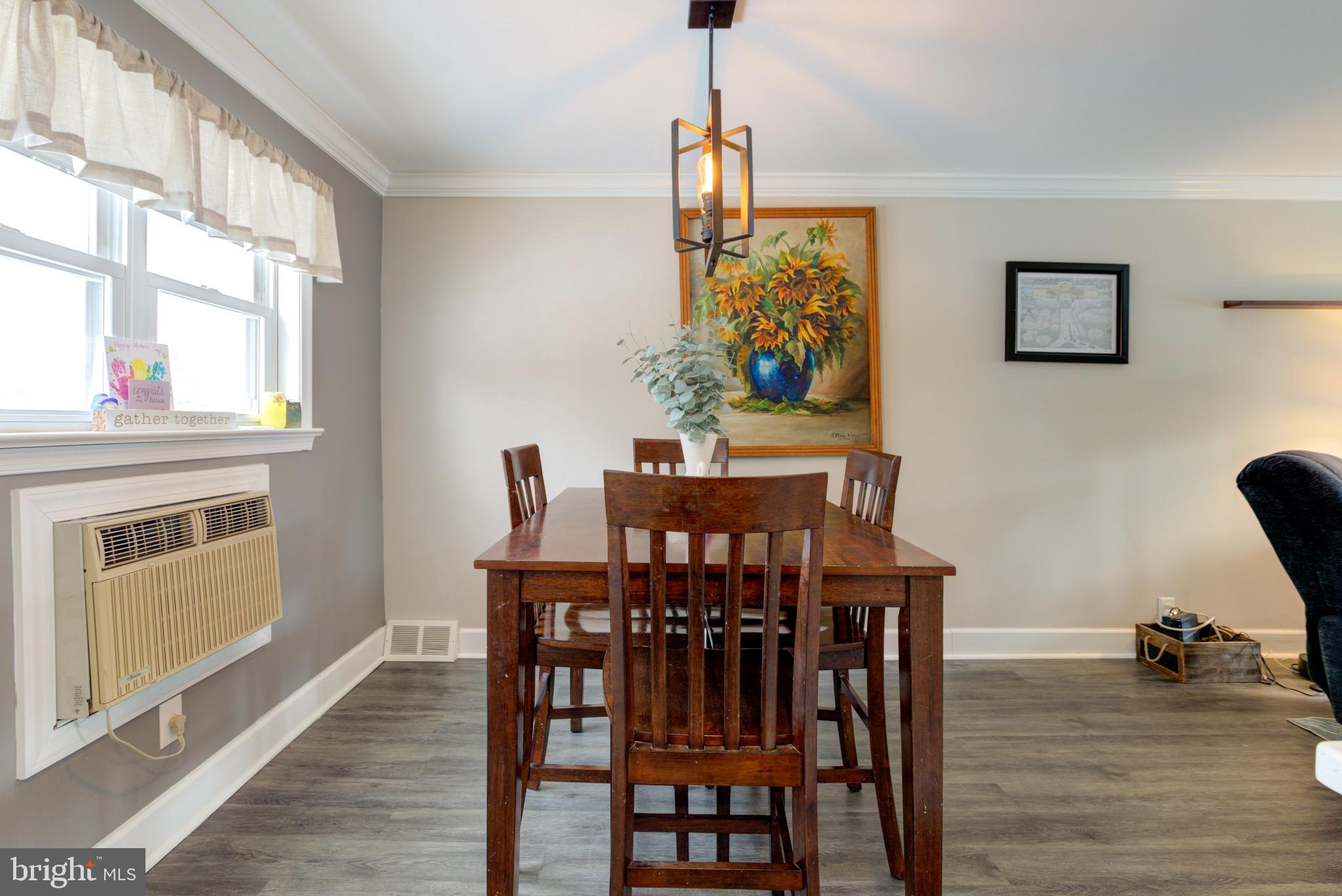 203 Overlook Road Philadelphia, PA 19128 - Photo 9 of 32 a view of a dining room with furniture and wooden floor