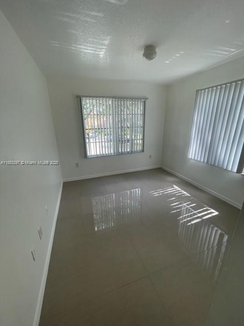 4271 San Marino Boulevard, Unit 206 West Palm Beach, FL 33409 - Photo 6 of 9 a view of room with window