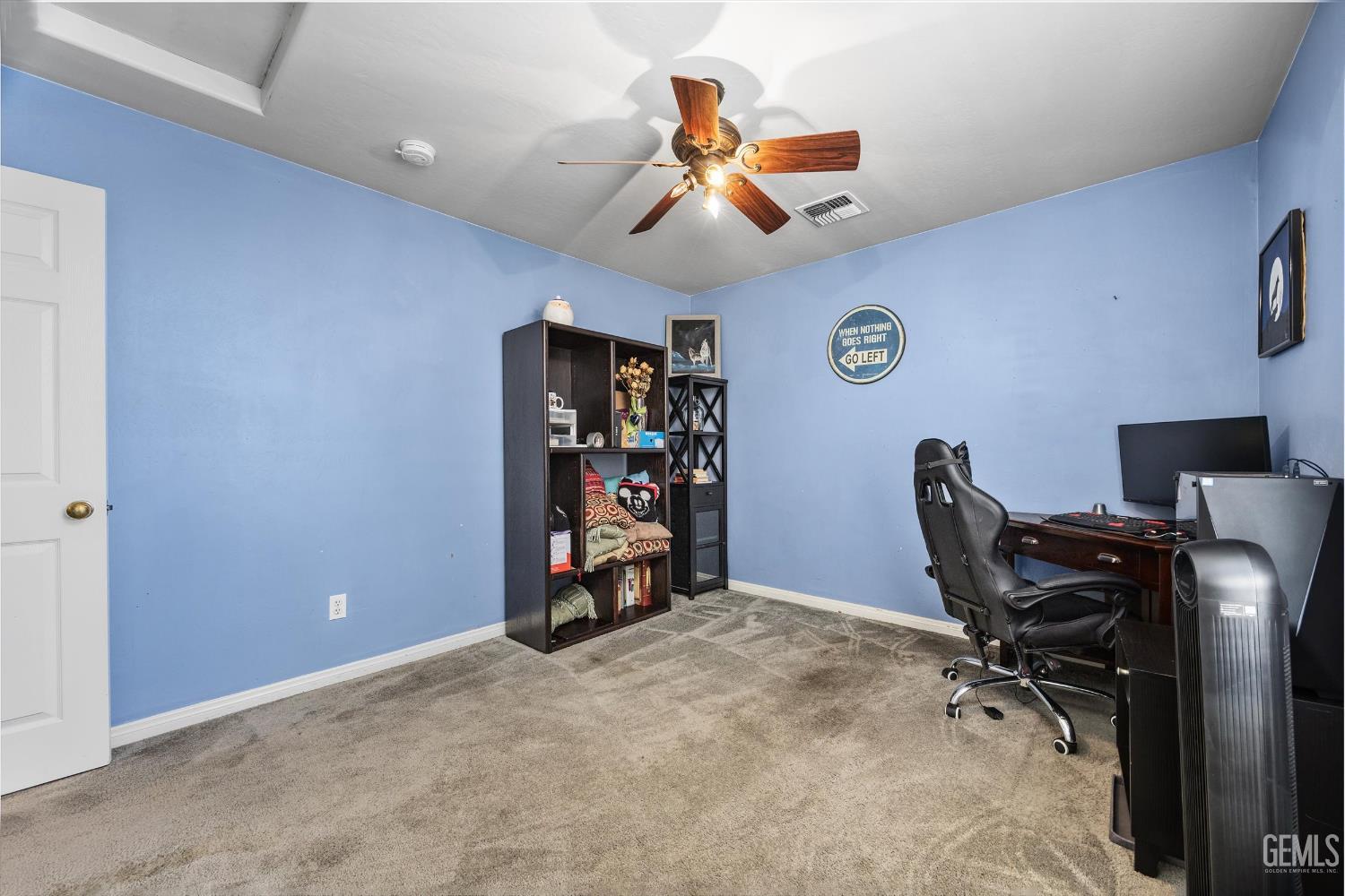 Undisclosed Address Bakersfield, CA 93301 - Photo 17 of 30 a view of a workspace with furniture