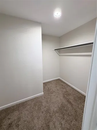 an empty room with a door