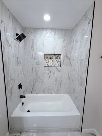 a bathroom with a bathtub