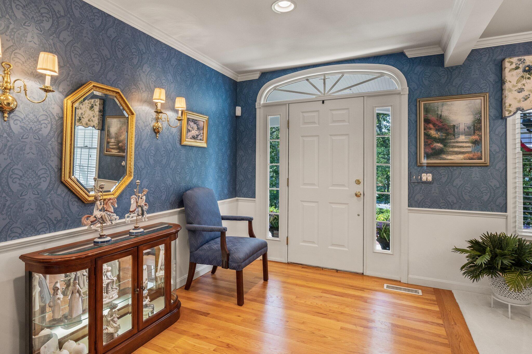 201 Forest Street Harwich, MA 02645 - Photo 7 of 59 a view of a livingroom with furniture and wooden floor