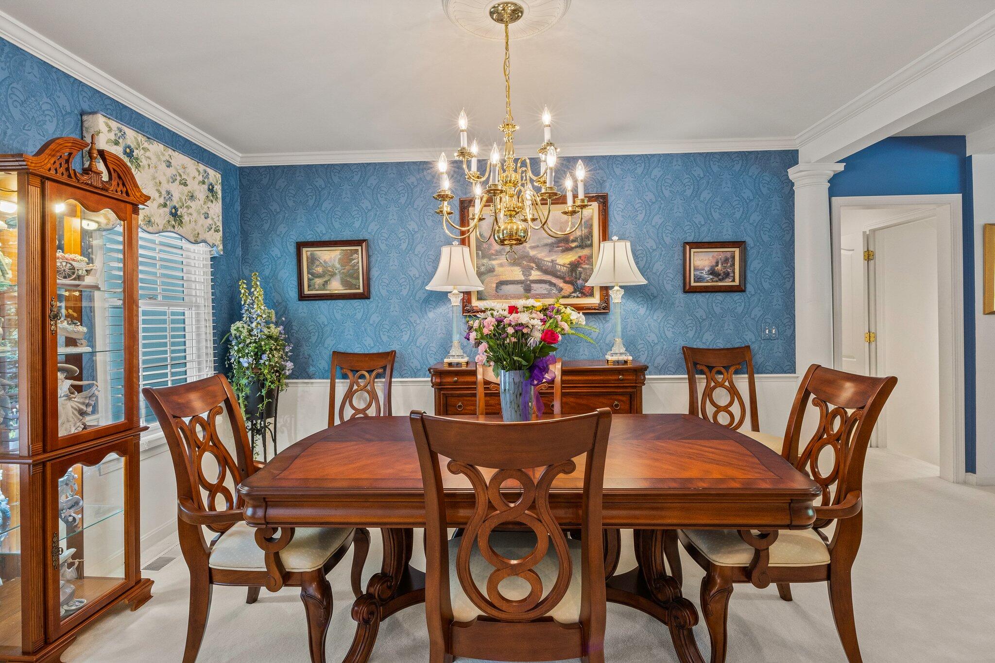 201 Forest Street Harwich, MA 02645 - Photo 8 of 59 a view of a dining room with furniture window and outside view