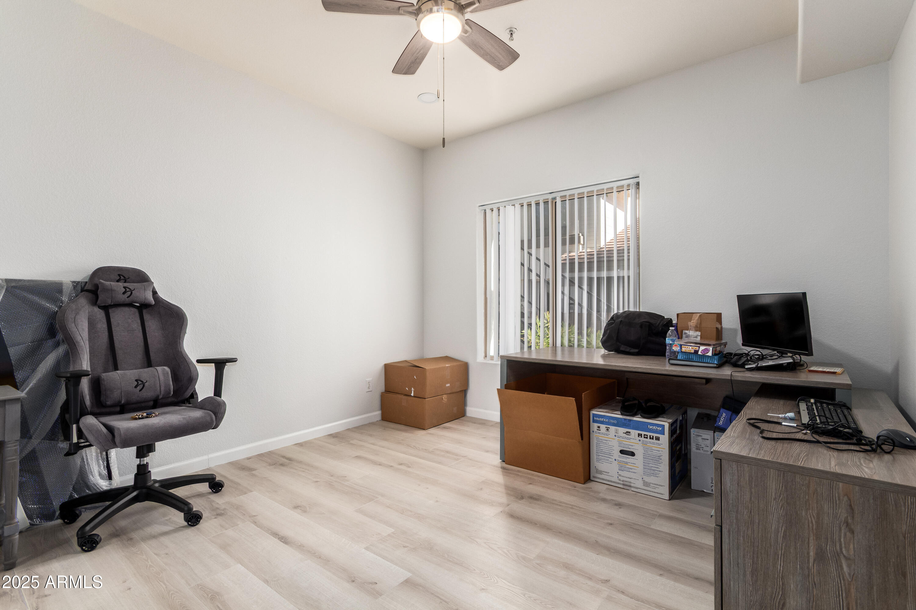 2201 North Comanche Drive, Unit 1080 Chandler, AZ 85224 - Photo 12 of 18 a view of a workspace with furniture and a window
