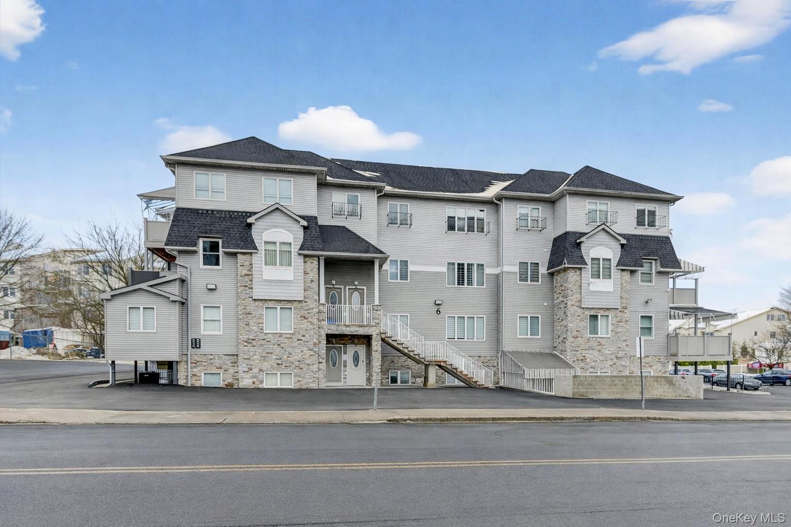 a white building with a outdoor space