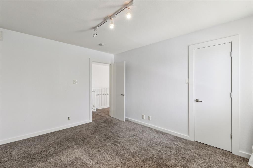 4777 Cedar Springs Road, Unit 6N Dallas, TX 75219 - Photo 18 of 24 a view of an empty room
