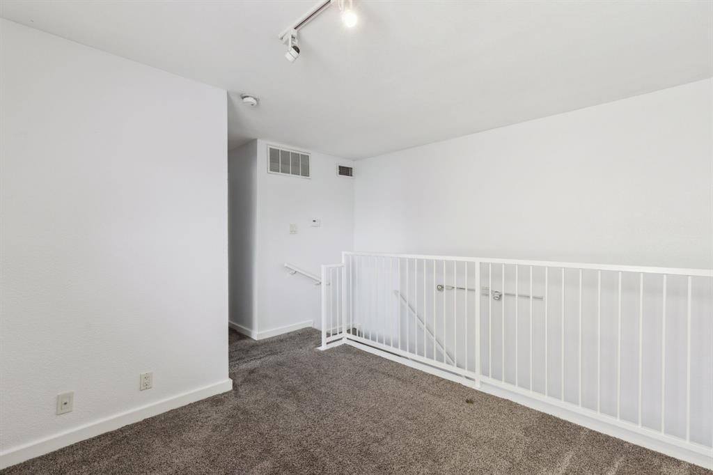 4777 Cedar Springs Road, Unit 6N Dallas, TX 75219 - Photo 19 of 24 wooden floor in an empty room